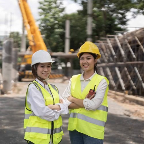 Portrait two engineer asian woman building contractors standing at construction site
